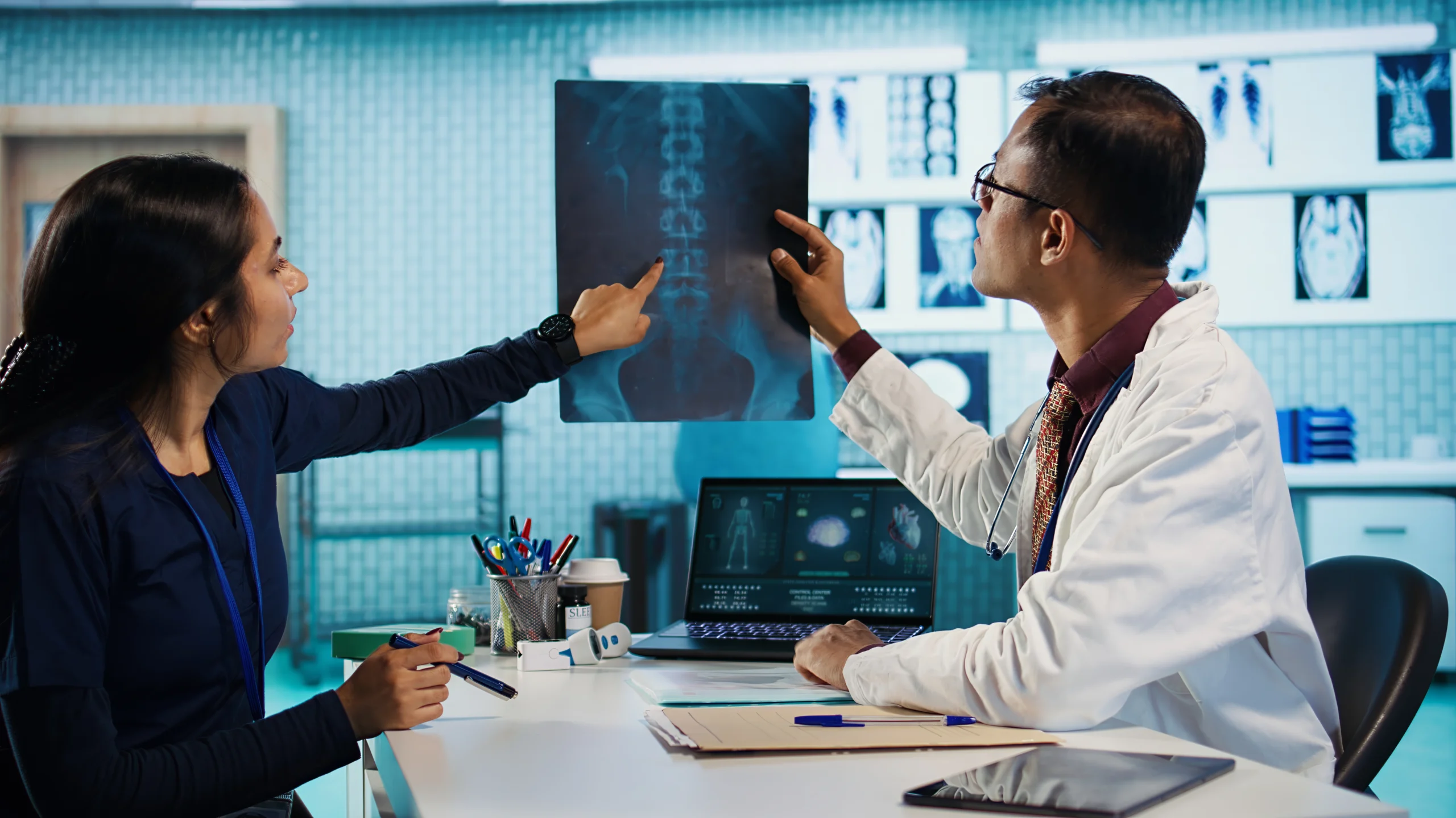 indian-medic-reviewing-diagnostics-through-test-results-with-nurse